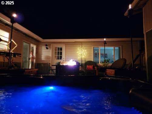 24795 Parkside Drive Veneta, OR 97487 - Photo 42 of 42 a living room with furniture and a fireplace