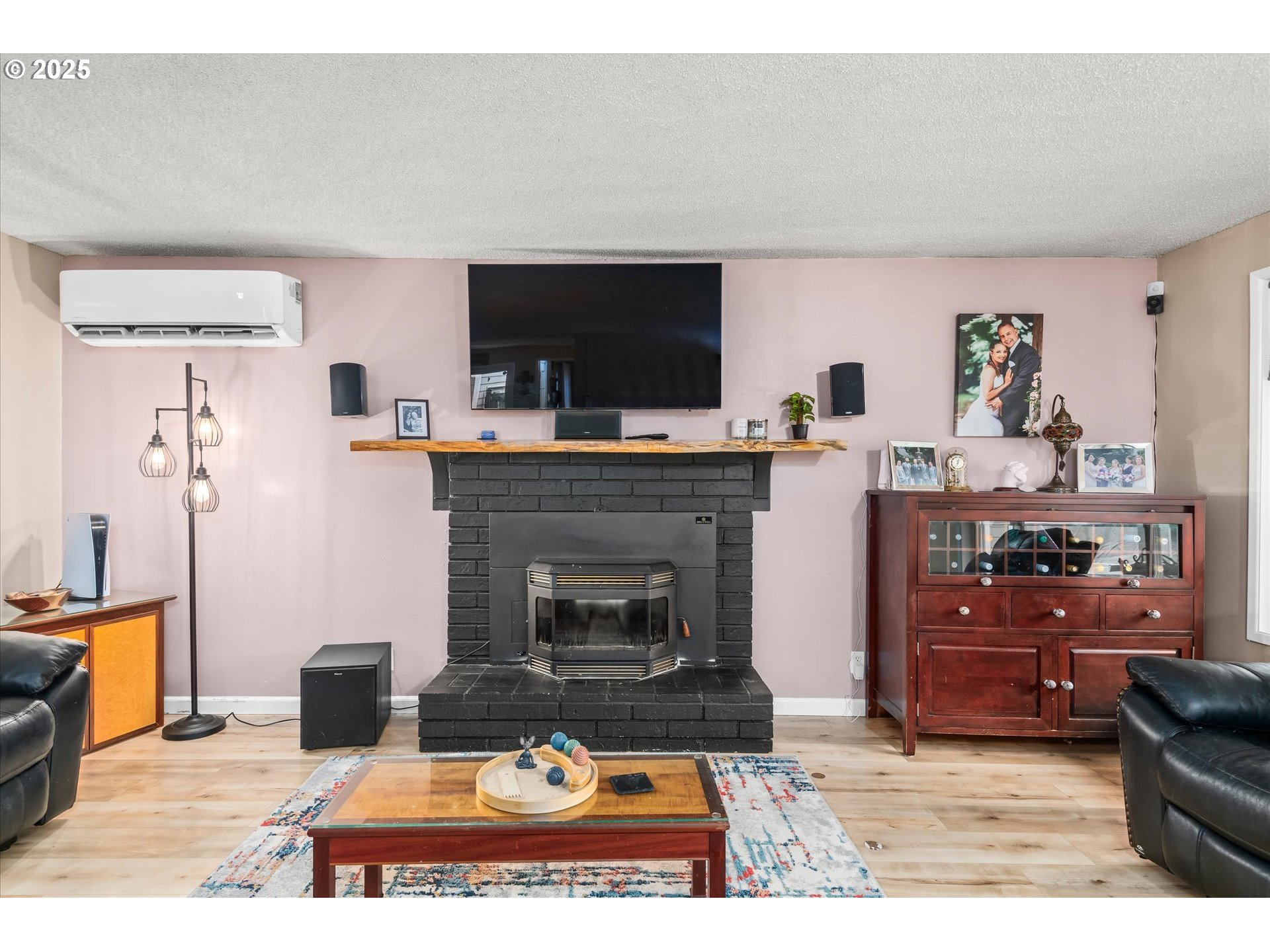 24795 Parkside Drive Veneta, OR 97487 - Photo 8 of 42 a living room with furniture and a fireplace