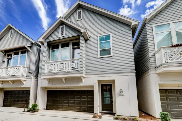 a view of a house with a garage