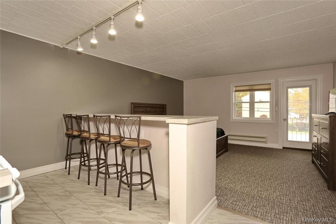 30 Rte 9W, Unit 31 Congers, NY 10920 - Photo 3 of 18 The eating counter overlooks the living/sleeping area.