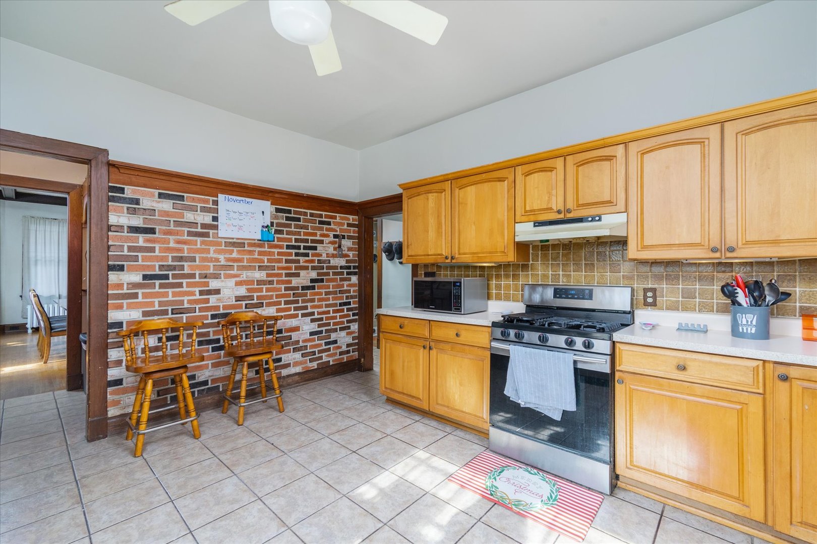 532 7th Street LaSalle, IL 61301 - Photo 17 of 36 a kitchen with stainless steel appliances a stove a sink and cabinets