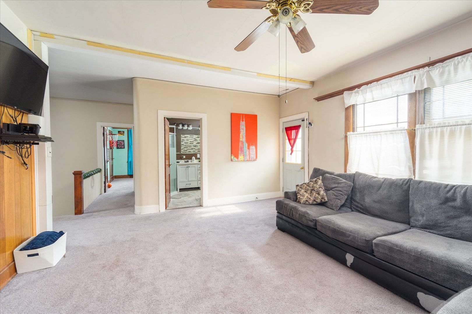 532 7th Street LaSalle, IL 61301 - Photo 20 of 36 a living room with furniture and a flat screen tv