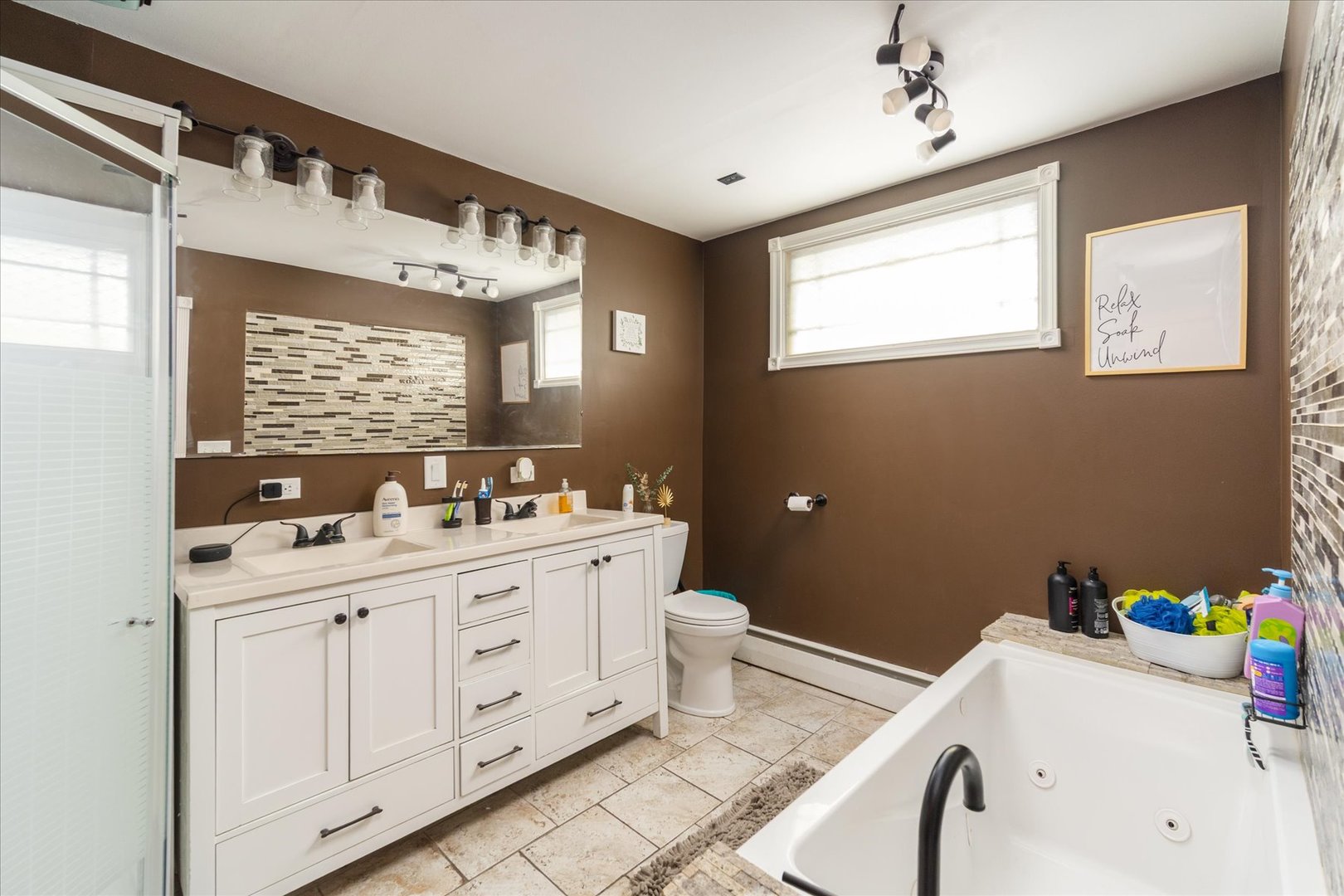 532 7th Street LaSalle, IL 61301 - Photo 22 of 36 a bathroom with a sink mirror and a bathtub
