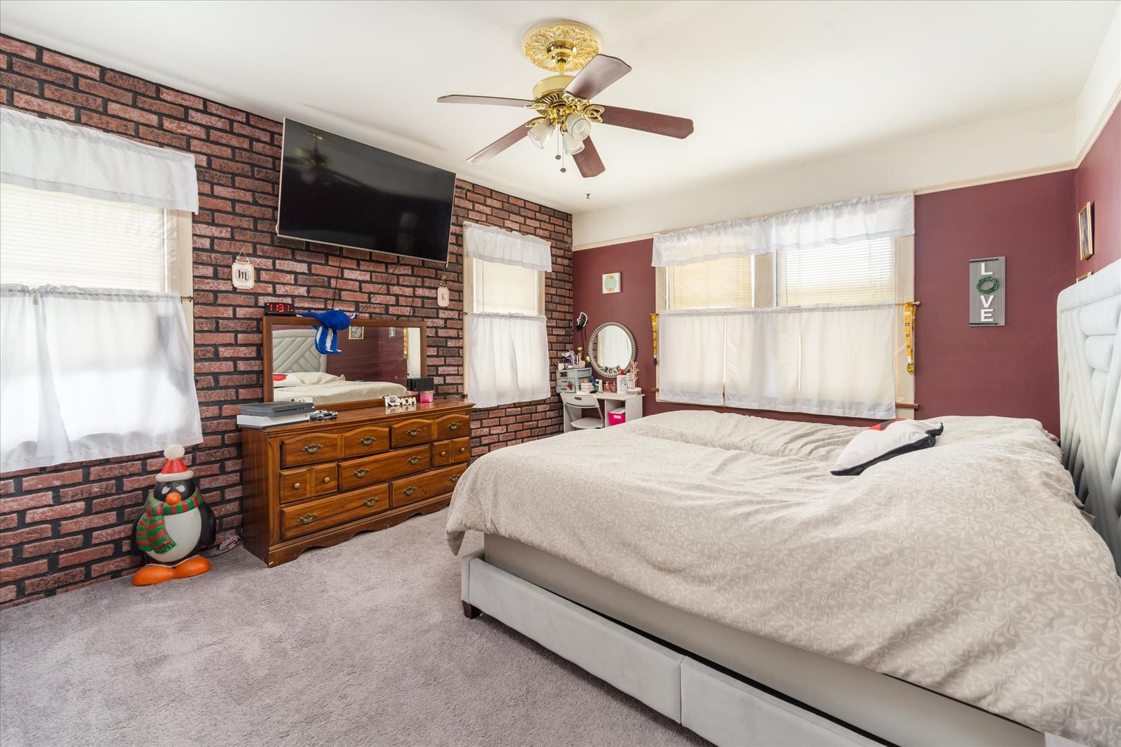 532 7th Street LaSalle, IL 61301 - Photo 24 of 36 a bedroom with a bed and a chandelier