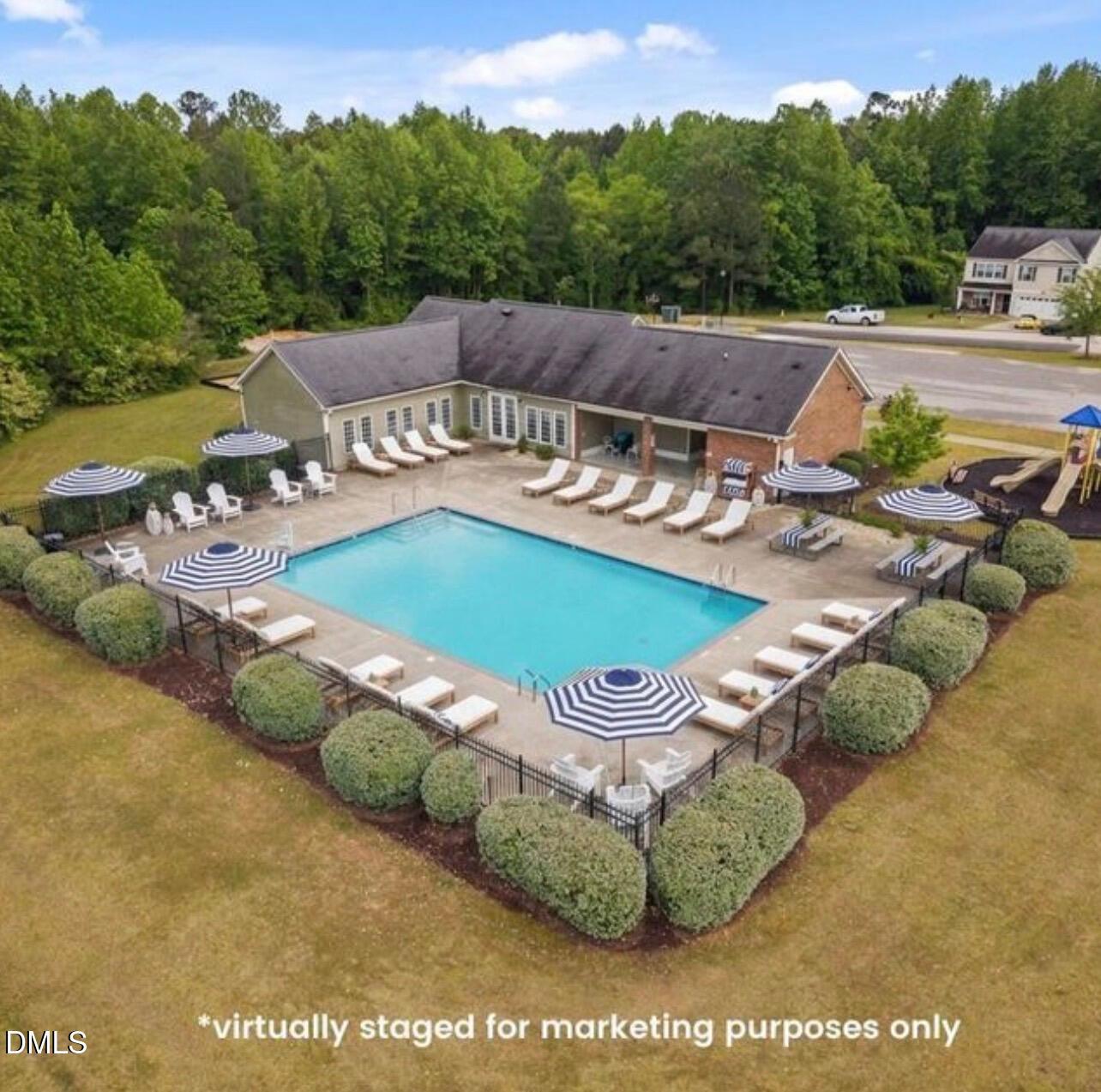 205 Battery Way Bunnlevel, NC 28323 - Photo 37 of 37 a view of a swimming pool with a yard