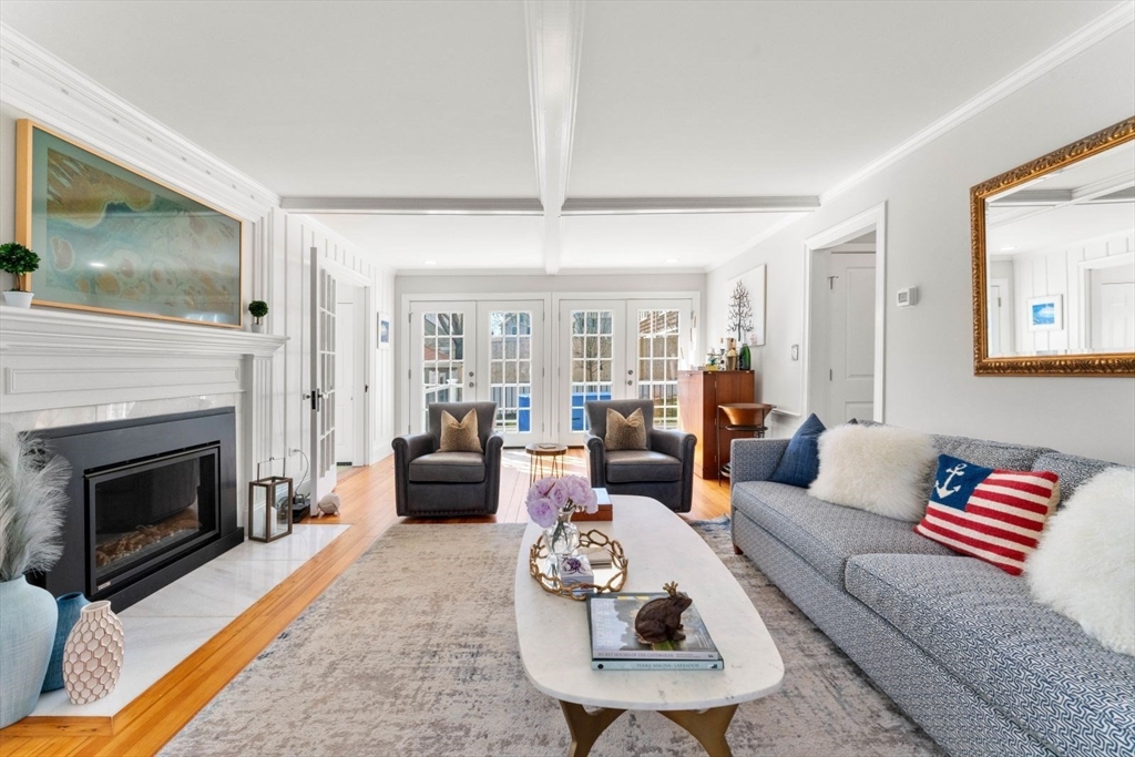 19 Damon Road Scituate, MA 02066 - Photo 13 of 33 a living room with furniture and a fireplace