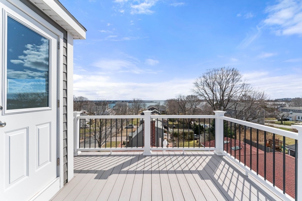 19 Damon Road Scituate, MA 02066 - Photo 23 of 33 a view of a balcony with wooden floor