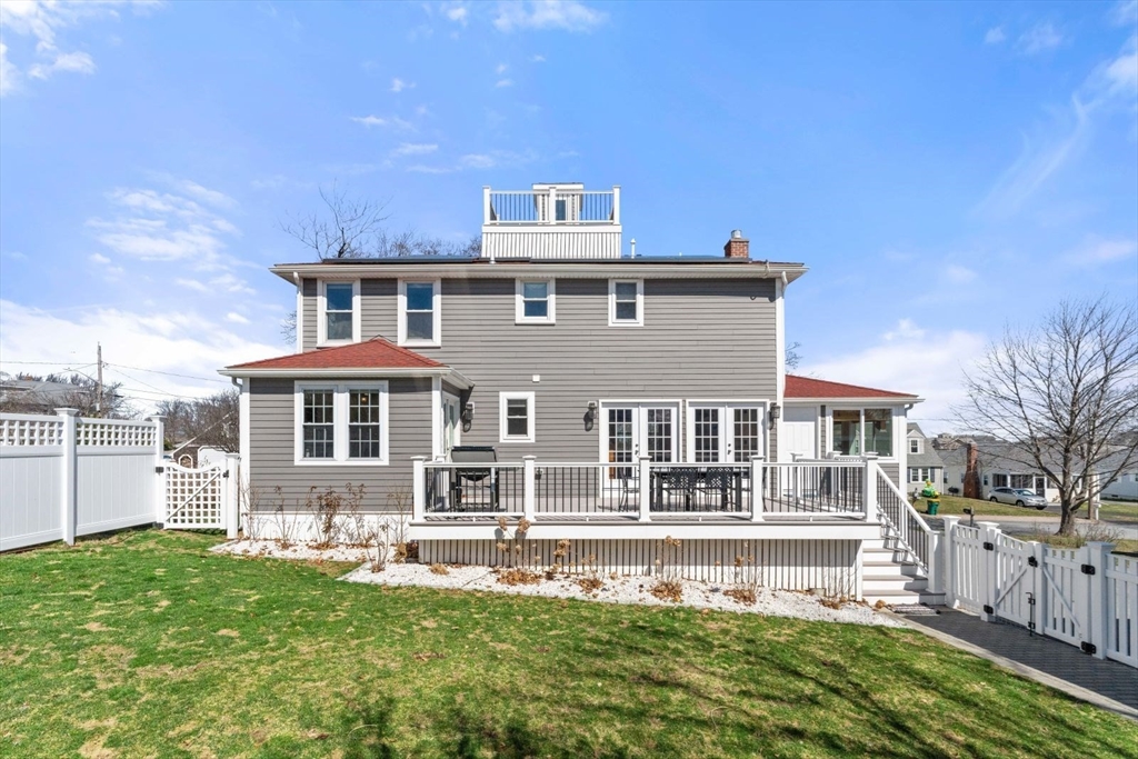 19 Damon Road Scituate, MA 02066 - Photo 28 of 33 a front view of a house with a yard table and chairs
