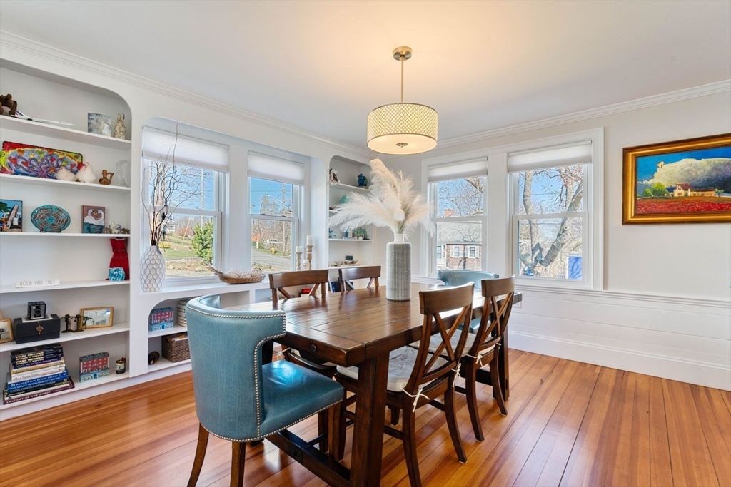 19 Damon Road Scituate, MA 02066 - Photo 6 of 33 a view of a dining room with furniture wooden floor and chandelier