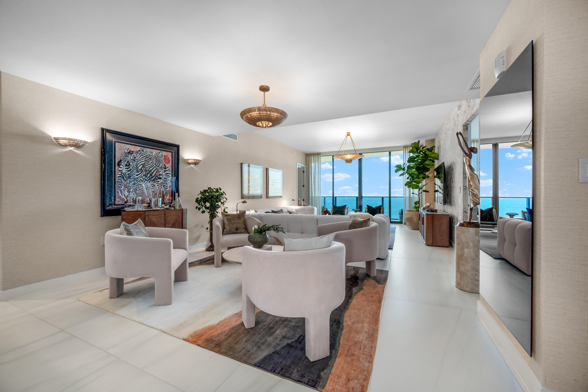 900 North Ocean Boulevard, Unit MPH02 Pompano Beach, FL 33062 - Photo 11 of 36 a living room with furniture and a large window