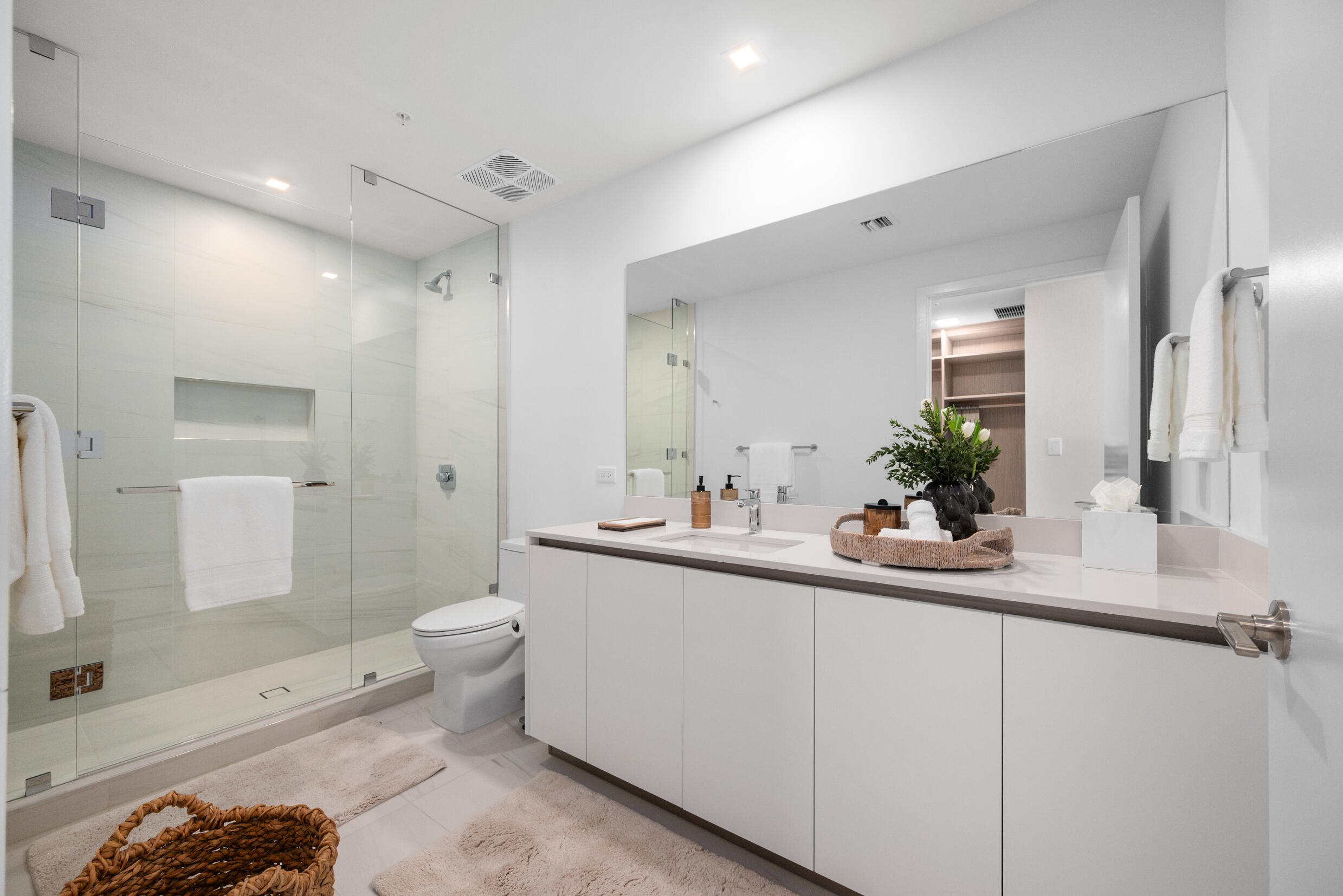 900 North Ocean Boulevard, Unit MPH02 Pompano Beach, FL 33062 - Photo 21 of 36 a bathroom with a sink a toilet and shower