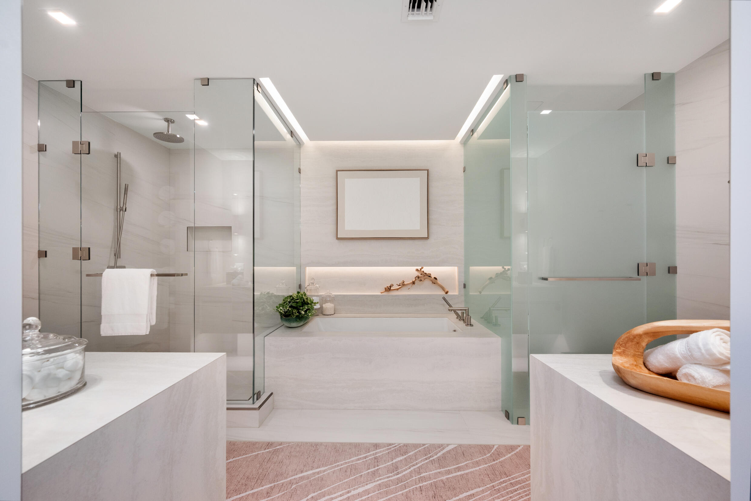 900 North Ocean Boulevard, Unit MPH02 Pompano Beach, FL 33062 - Photo 28 of 36 a bathroom with a tub sink and mirror