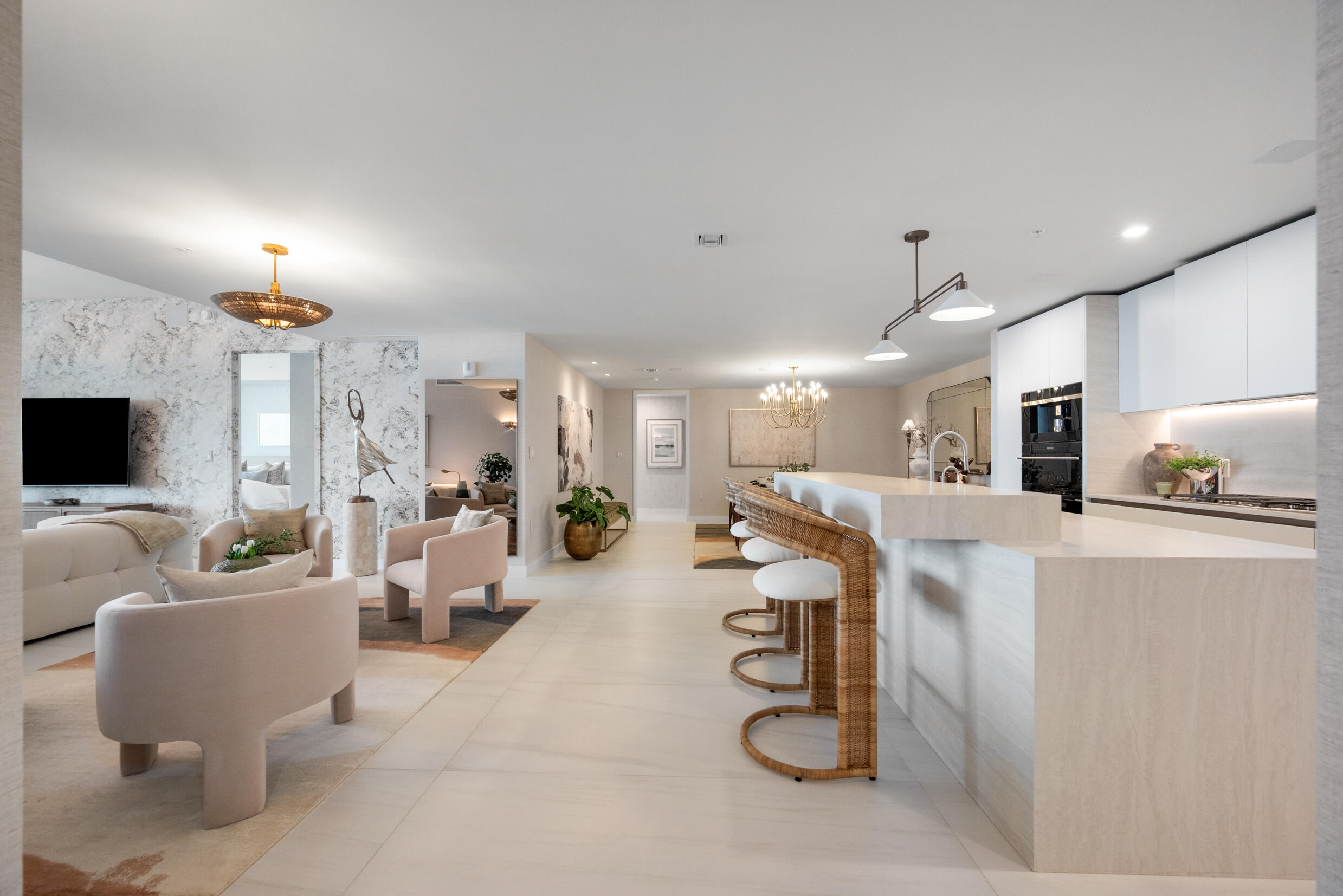 900 North Ocean Boulevard, Unit MPH02 Pompano Beach, FL 33062 - Photo 3 of 36 a living room with furniture and a flat screen tv