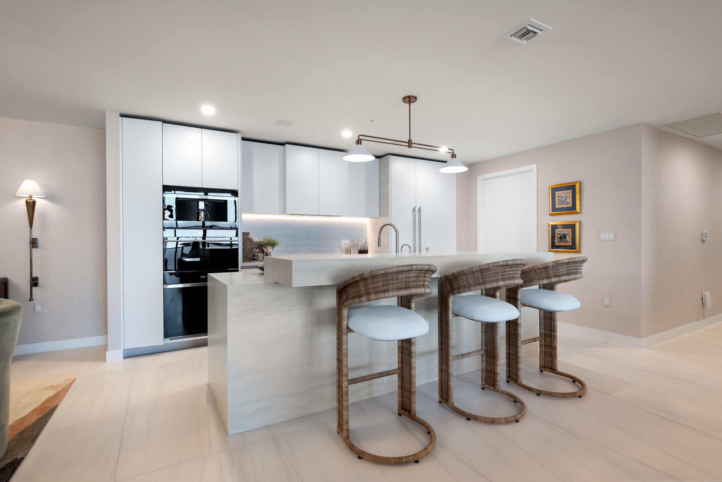 900 North Ocean Boulevard, Unit MPH02 Pompano Beach, FL 33062 - Photo 5 of 36 a living room with furniture and a table