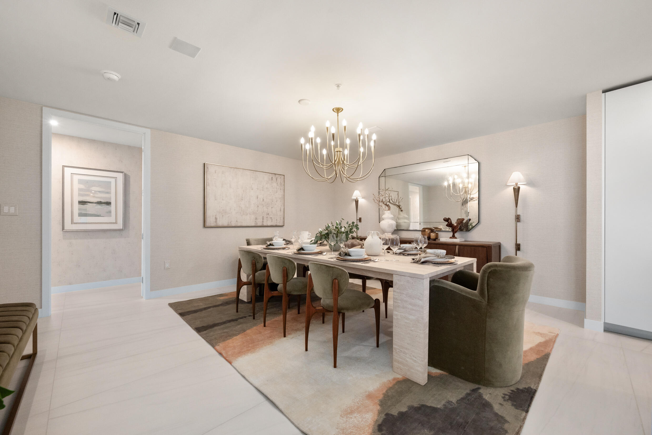 900 North Ocean Boulevard, Unit MPH02 Pompano Beach, FL 33062 - Photo 9 of 36 a view of a dining room with furniture and chandelier