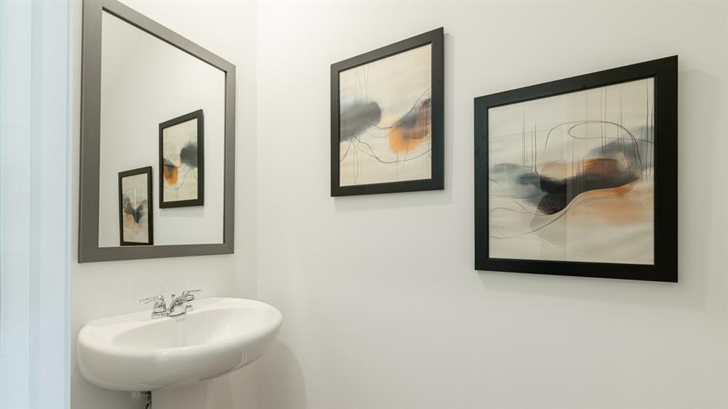 2836 Georgia Aster Way Northwest Atlanta, GA 30341 - Photo 11 of 28 a bathroom with a sink and a mirror