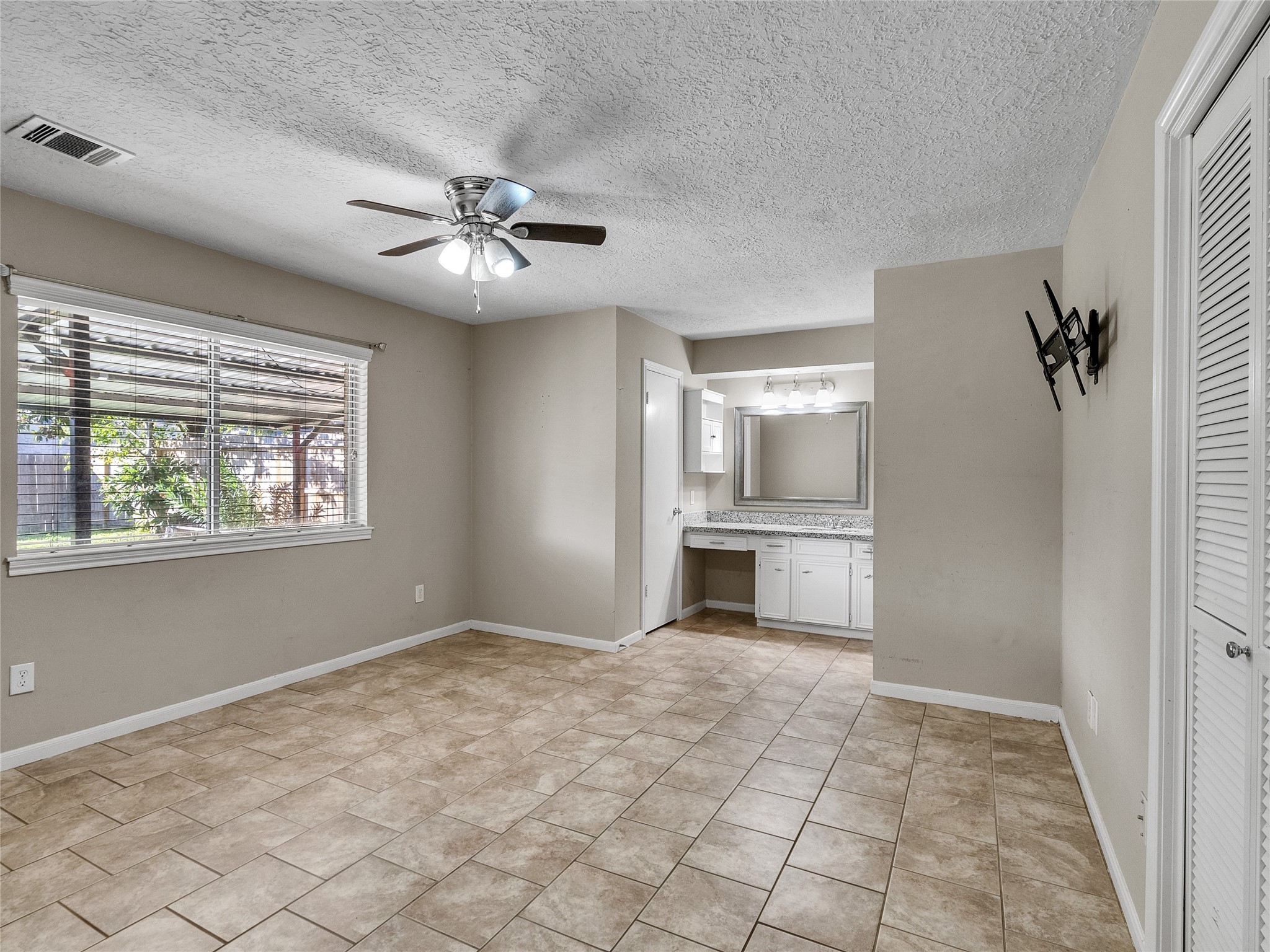 2201 Georgetown Street Katy, TX 77493 - Photo 12 of 20 a view of a kitchen with a sink and a window