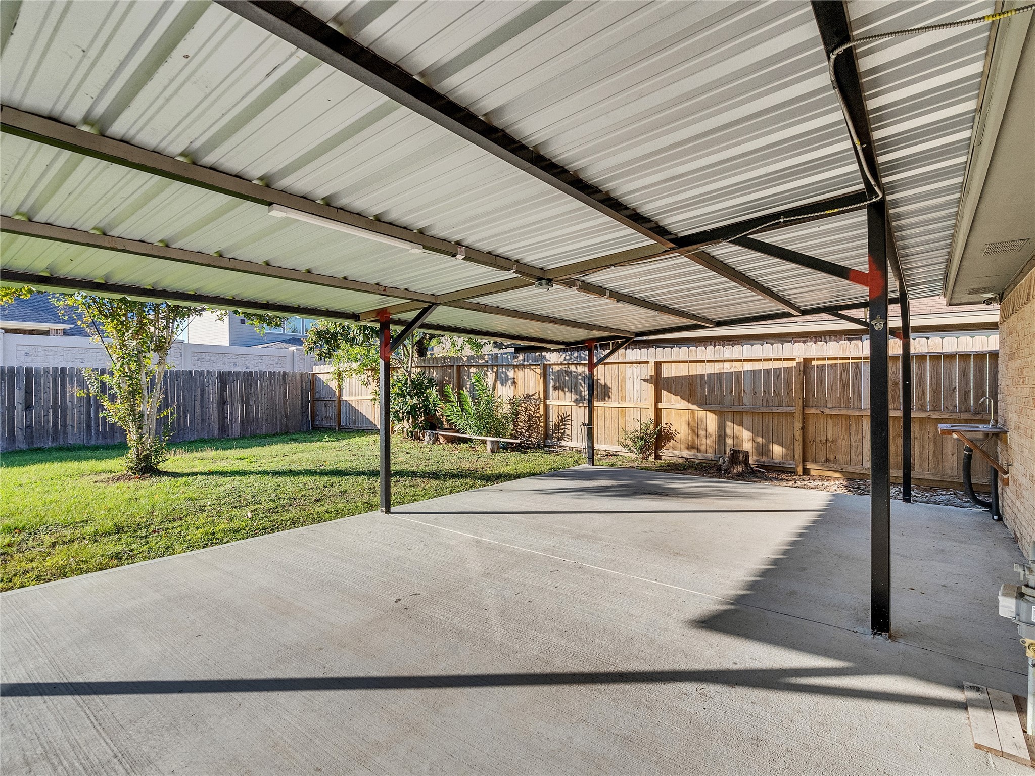 2201 Georgetown Street Katy, TX 77493 - Photo 19 of 20 a view of a house with a backyard