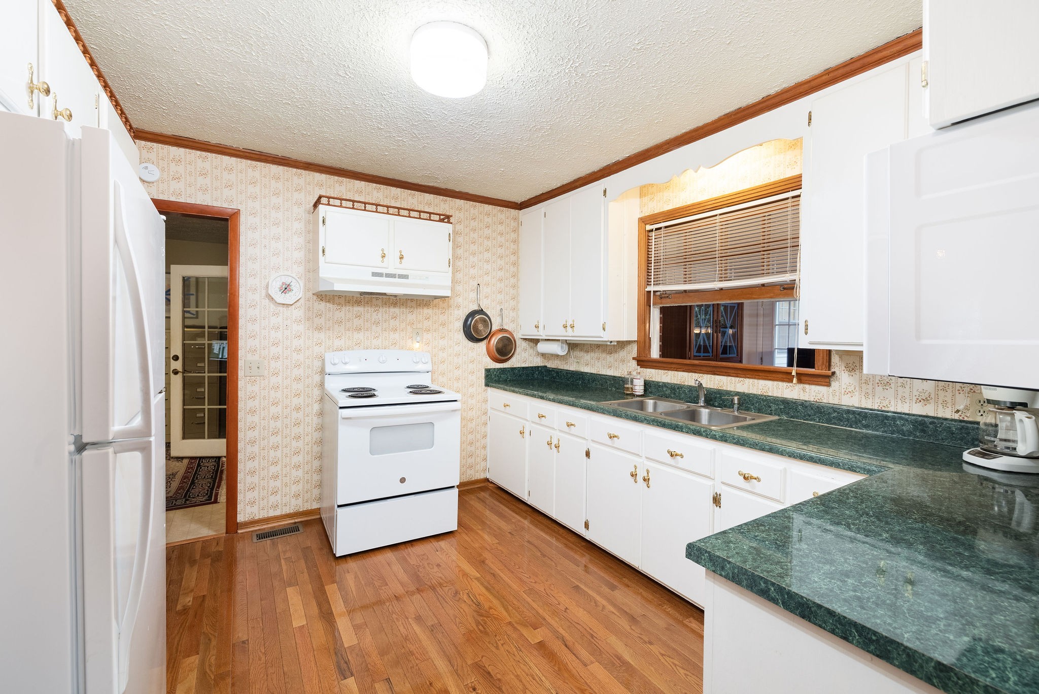 805 Vantrease Road Madison, TN 37115 - Photo 20 of 60 a kitchen with stainless steel appliances granite countertop a stove and a sink