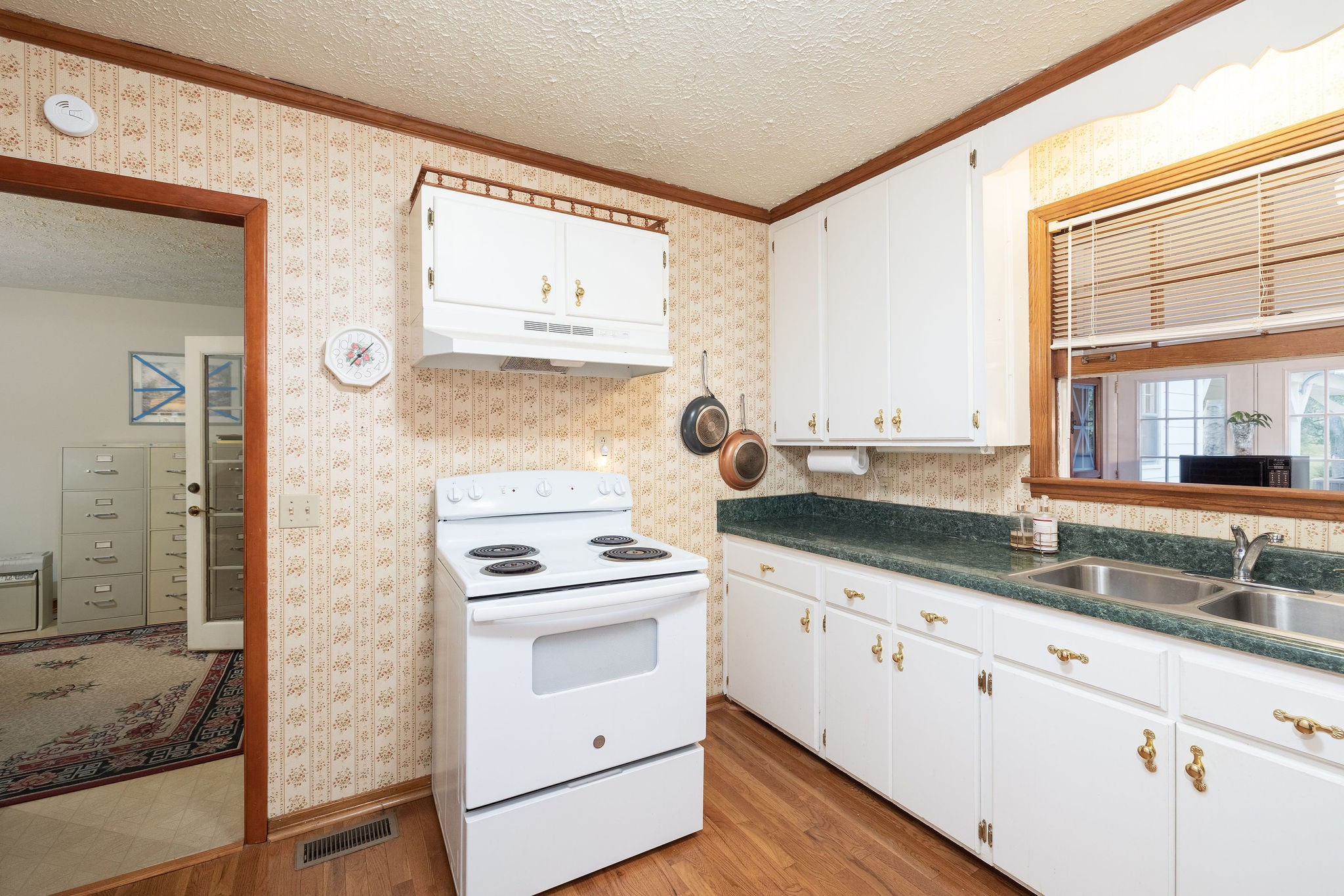 805 Vantrease Road Madison, TN 37115 - Photo 21 of 60 a kitchen with granite countertop a sink stainless steel appliances and cabinets