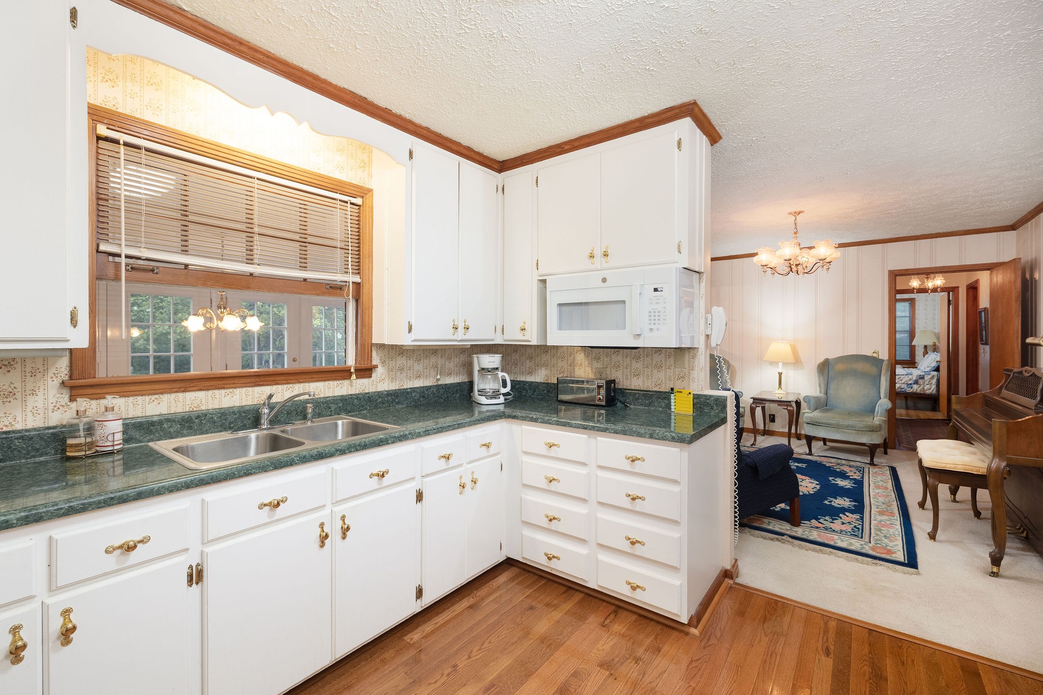 805 Vantrease Road Madison, TN 37115 - Photo 22 of 60 a kitchen with granite countertop a sink and cabinets
