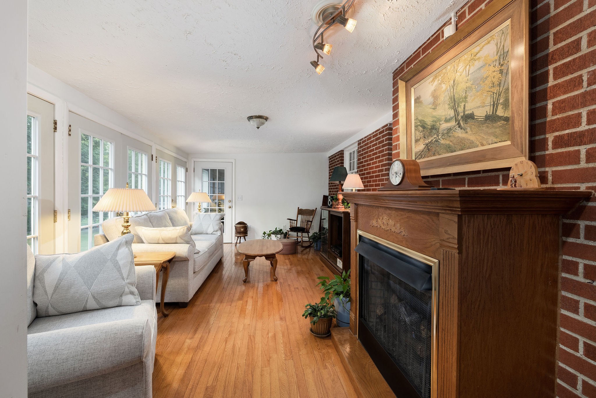 805 Vantrease Road Madison, TN 37115 - Photo 26 of 60 a living room with furniture a large window and a fireplace