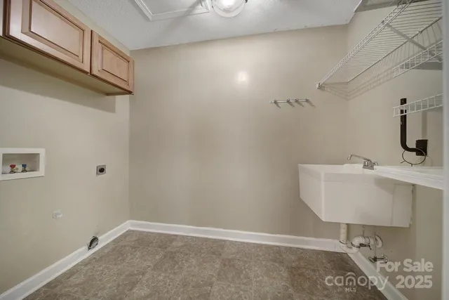 a bathroom with a sink and shower