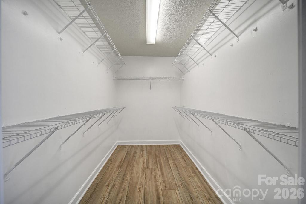 4394 Mountain Creek Road Iron Station, NC 28080 - Photo 21 of 45 a view of a room with racks on the wall