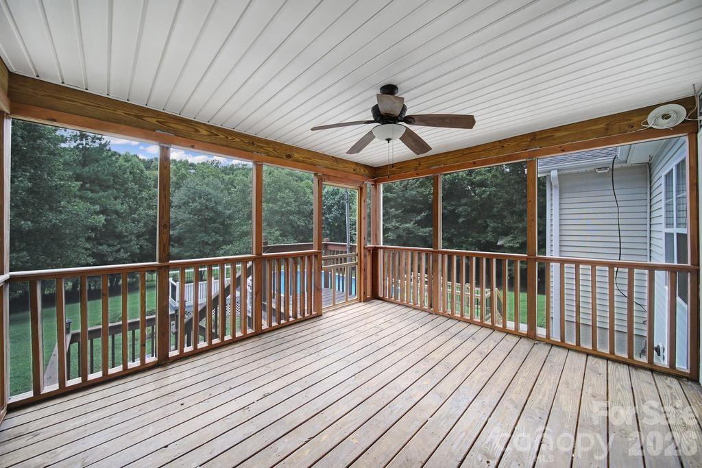 4394 Mountain Creek Road Iron Station, NC 28080 - Photo 32 of 45 a view of a balcony with wooden floor