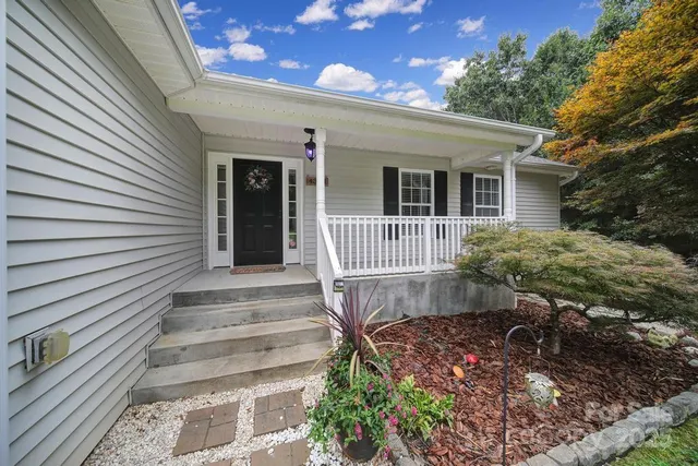 a front view of a house with a porch