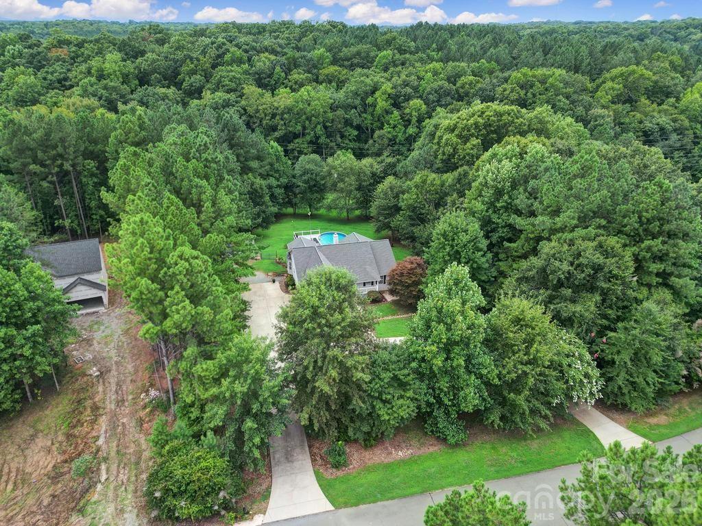 4394 Mountain Creek Road Iron Station, NC 28080 - Photo 45 of 45 an aerial view of a house with yard