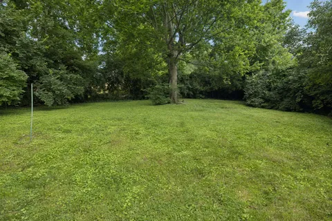 a house view with a garden space