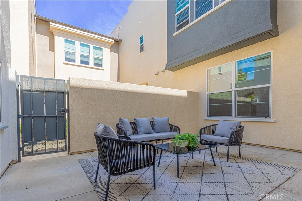 202 Cultivate Irvine, CA 92618 - Photo 11 of 65 a view of a two chairs in the balcony