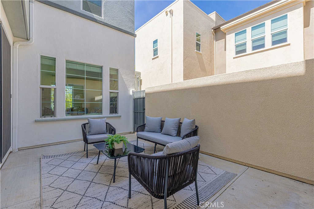 202 Cultivate Irvine, CA 92618 - Photo 12 of 65 a living room with furniture and a window