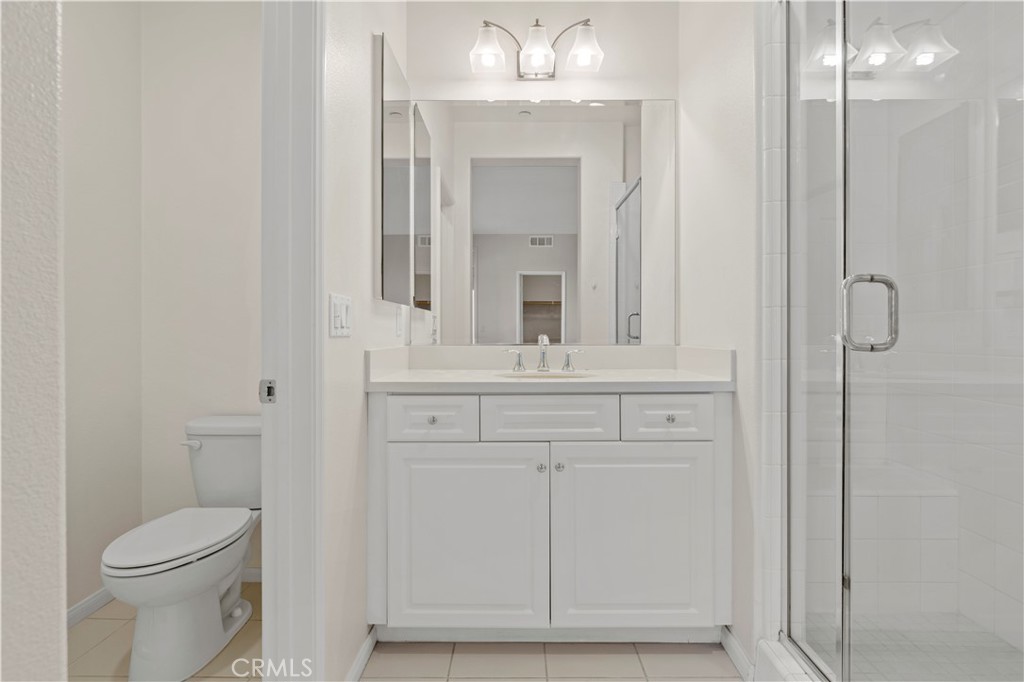202 Cultivate Irvine, CA 92618 - Photo 22 of 65 a bathroom with a sink a toilet and shower