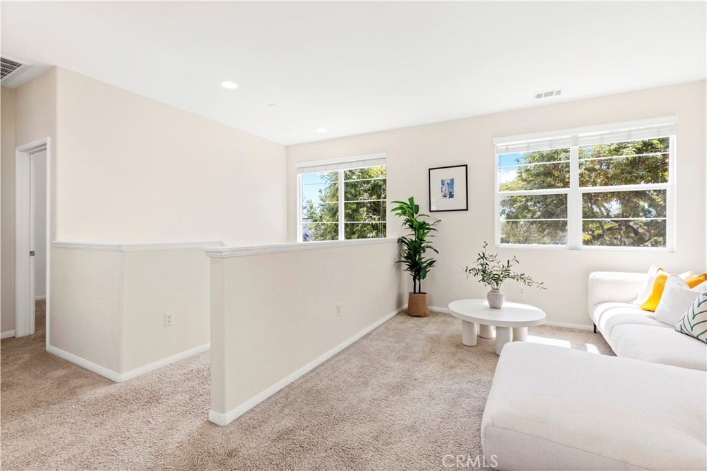 202 Cultivate Irvine, CA 92618 - Photo 29 of 65 a living room with furniture and window