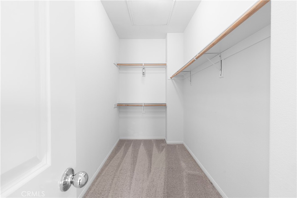 202 Cultivate Irvine, CA 92618 - Photo 32 of 65 a view of walk in closet with empty racks