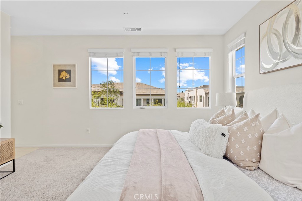 202 Cultivate Irvine, CA 92618 - Photo 34 of 65 a bed room with a bed and a large window