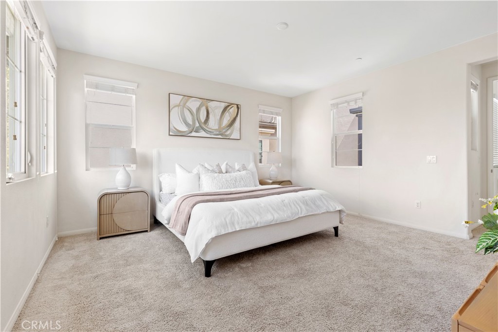 202 Cultivate Irvine, CA 92618 - Photo 36 of 65 a bedroom with a bed and a couch