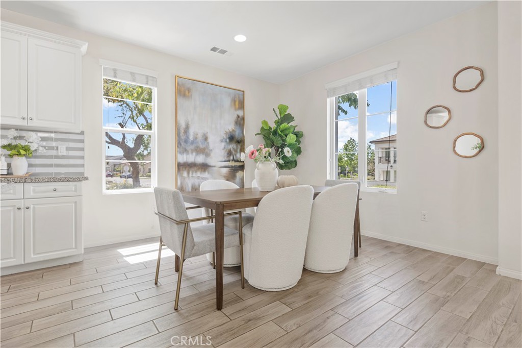 202 Cultivate Irvine, CA 92618 - Photo 4 of 65 a dining room with furniture and window