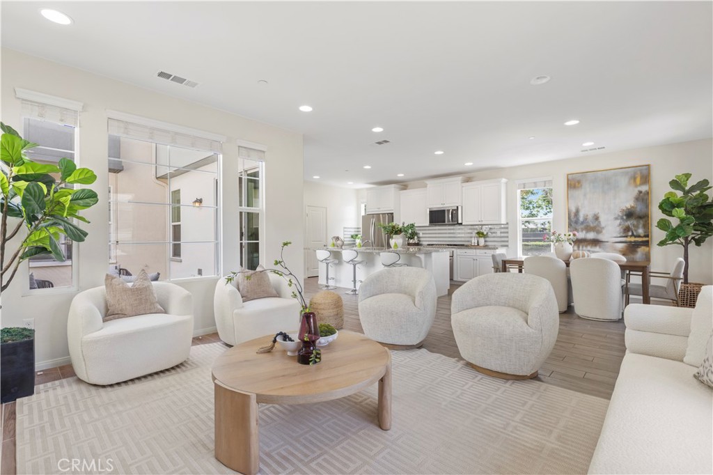 202 Cultivate Irvine, CA 92618 - Photo 5 of 65 a living room with furniture and a large window