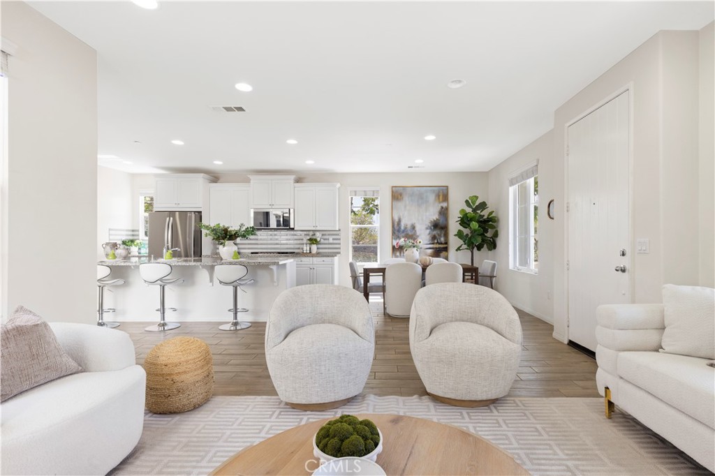 202 Cultivate Irvine, CA 92618 - Photo 6 of 65 a living room with furniture and a large window