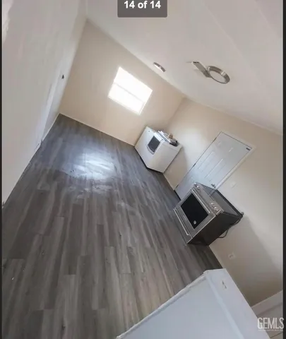 a living room with wooden floor