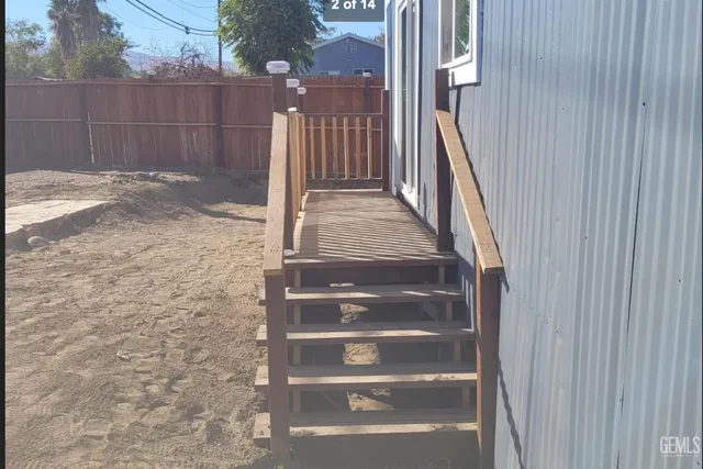 a view of entryway with a wooden door