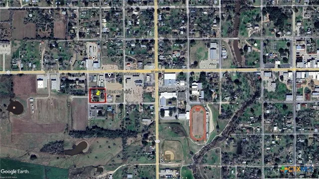 a view of swimming pool with a yard