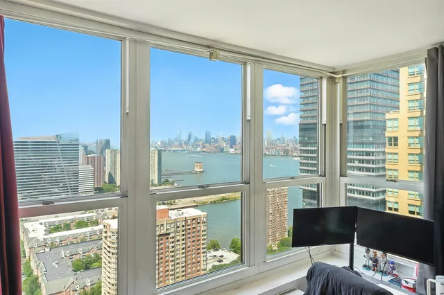 a living room with large window