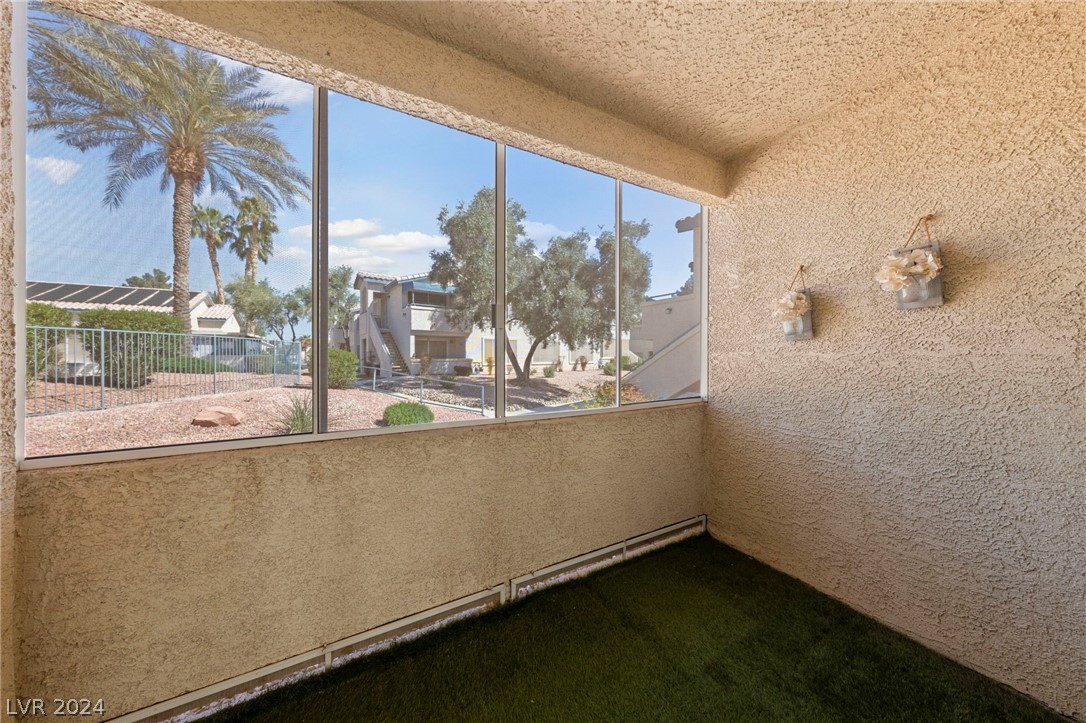 3425 East Russell Road, Unit 126 Las Vegas, NV 89120 - Photo 15 of 22 SCREENED IN PORCH WITH POOL VIEWS