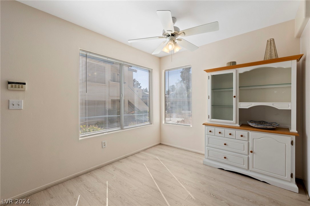 3425 East Russell Road, Unit 126 Las Vegas, NV 89120 - Photo 7 of 22 DINING AREA WITH HUTCH