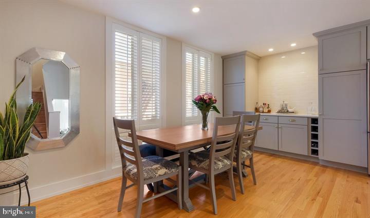 508 Addison Street Philadelphia, PA 19147 - Photo 6 of 14 a view of a dining room with furniture and a large window