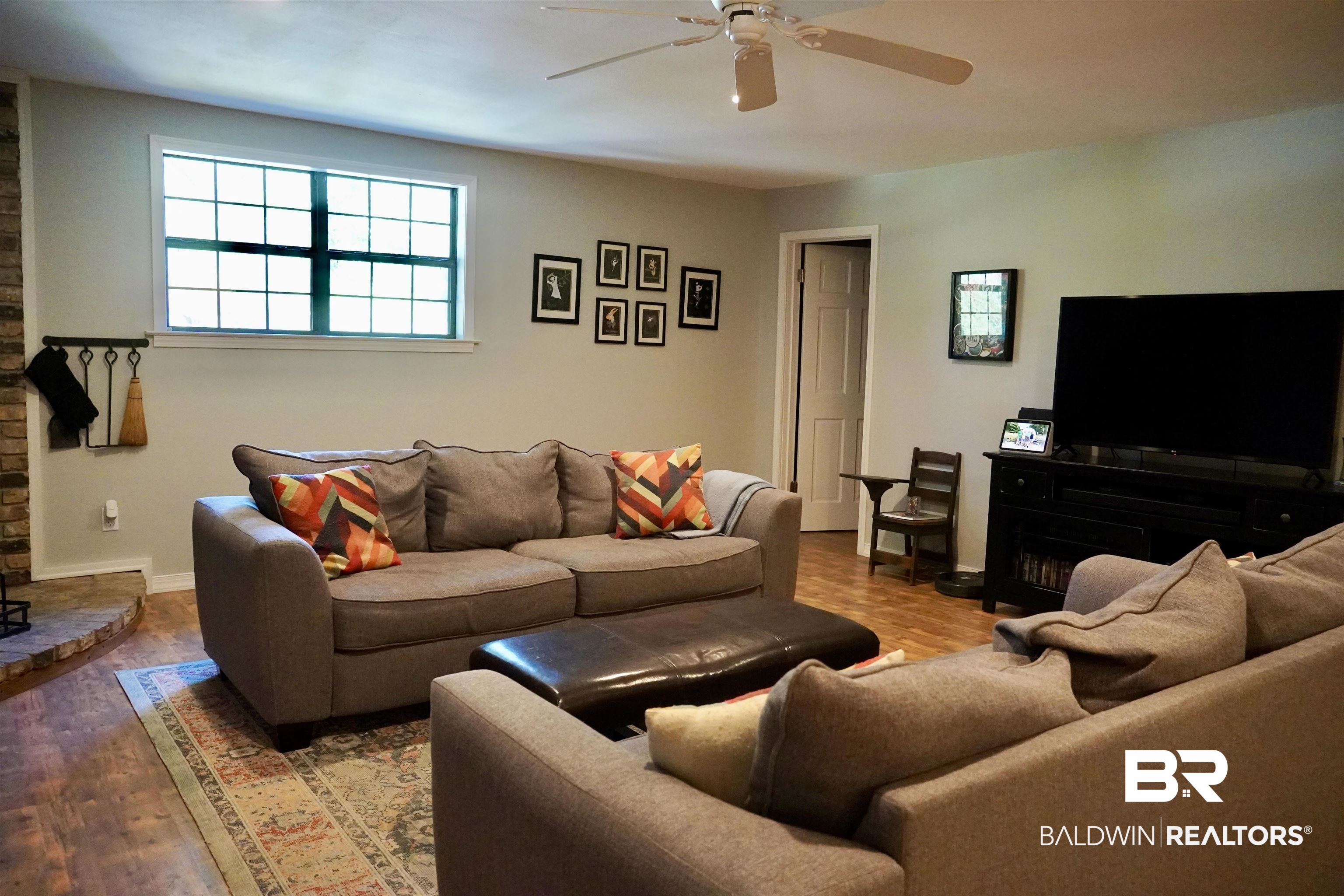 117 Belle Meade Brewton, AL 36426 - Photo 12 of 62 Living room with wood-type flooring and ceiling fan